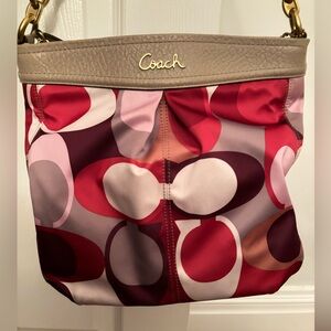Beautiful Coach berry-colored handbag
